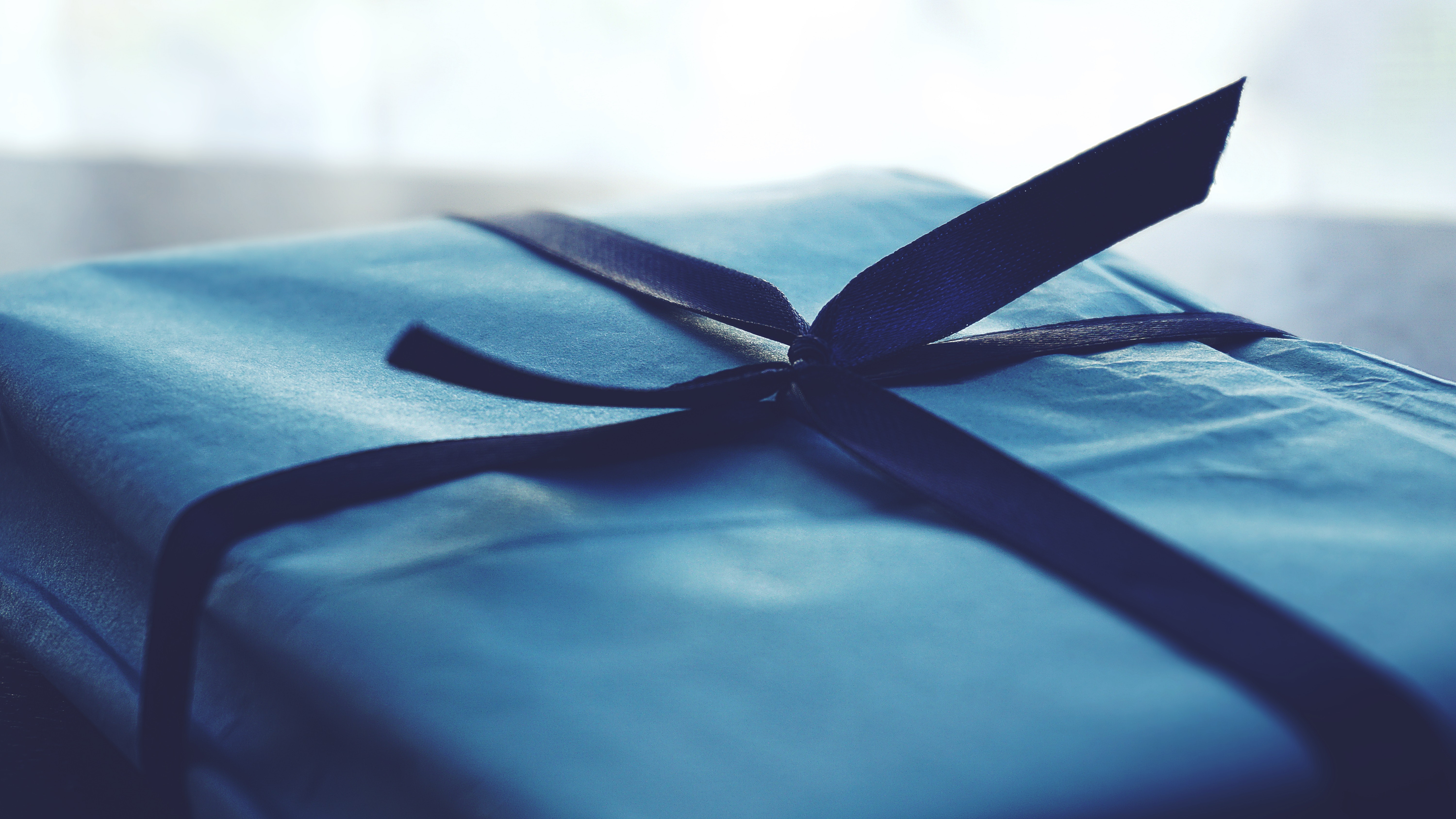 Blue Box with Ribbon - Focus on These Two Holiday Marketing KPIs