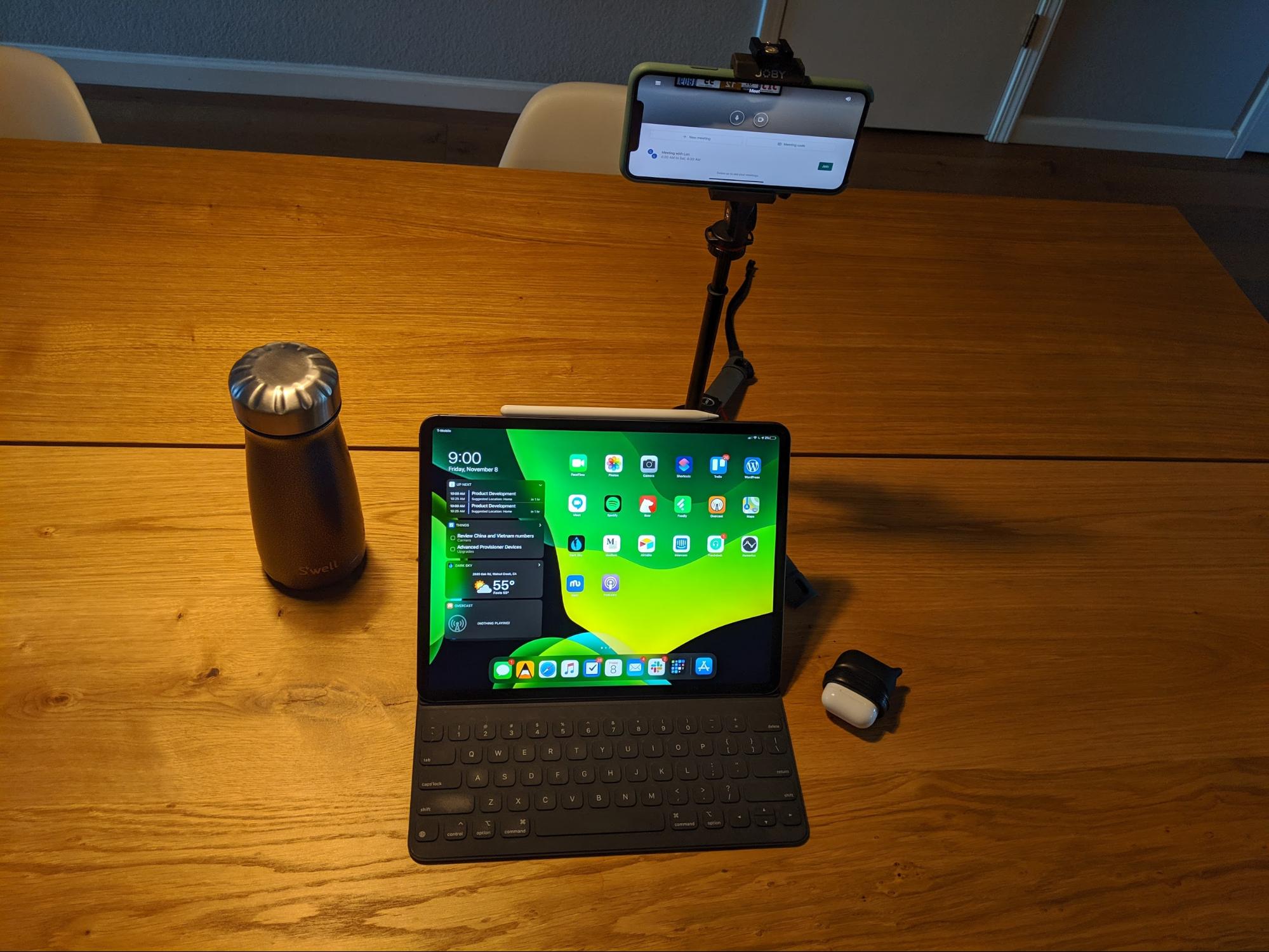 Setting up a Home Office for Remote Work - Lon Baker Tablet and Smartphone on Tripod