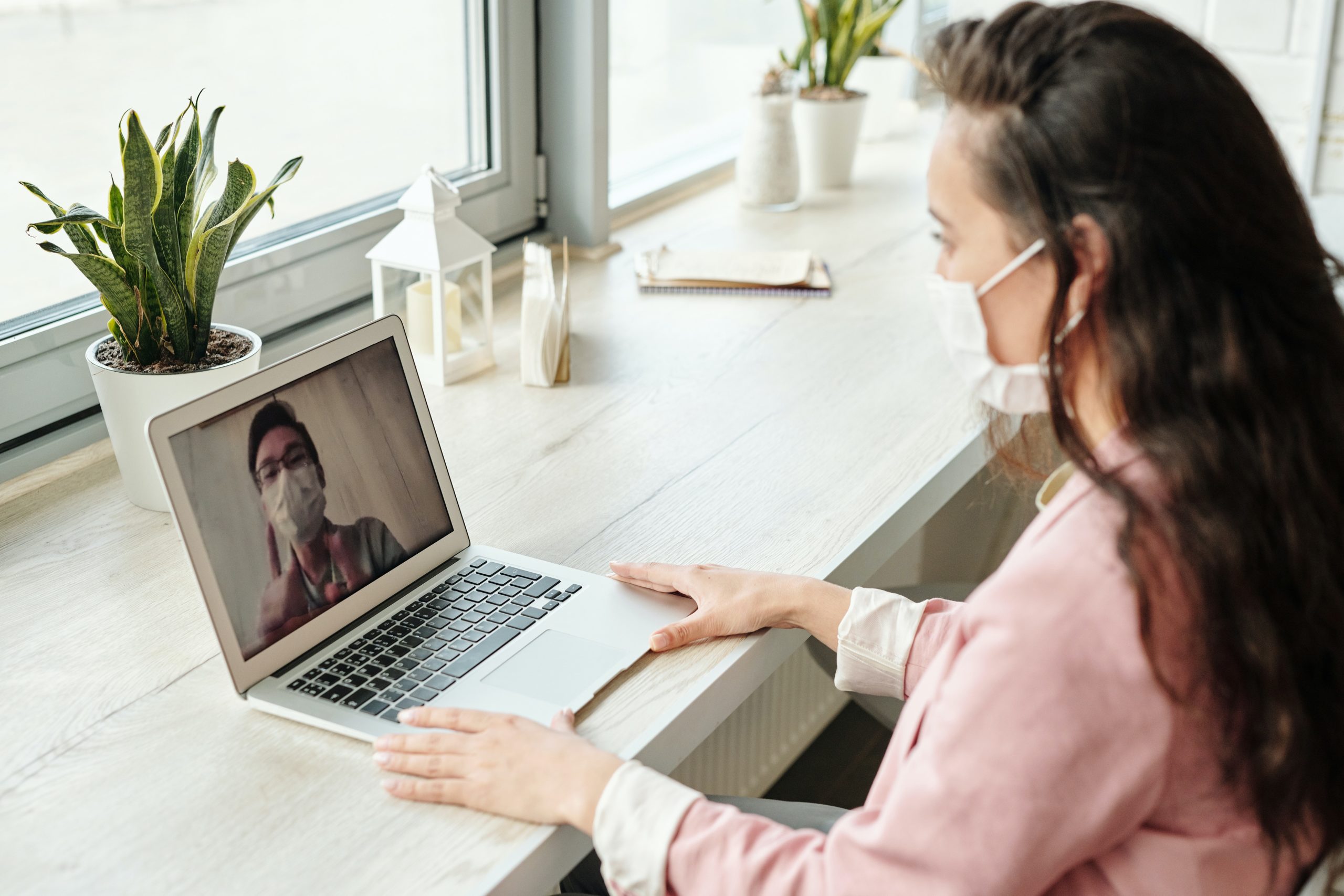 Two People on Video Call - Work From Home Communications Considerations