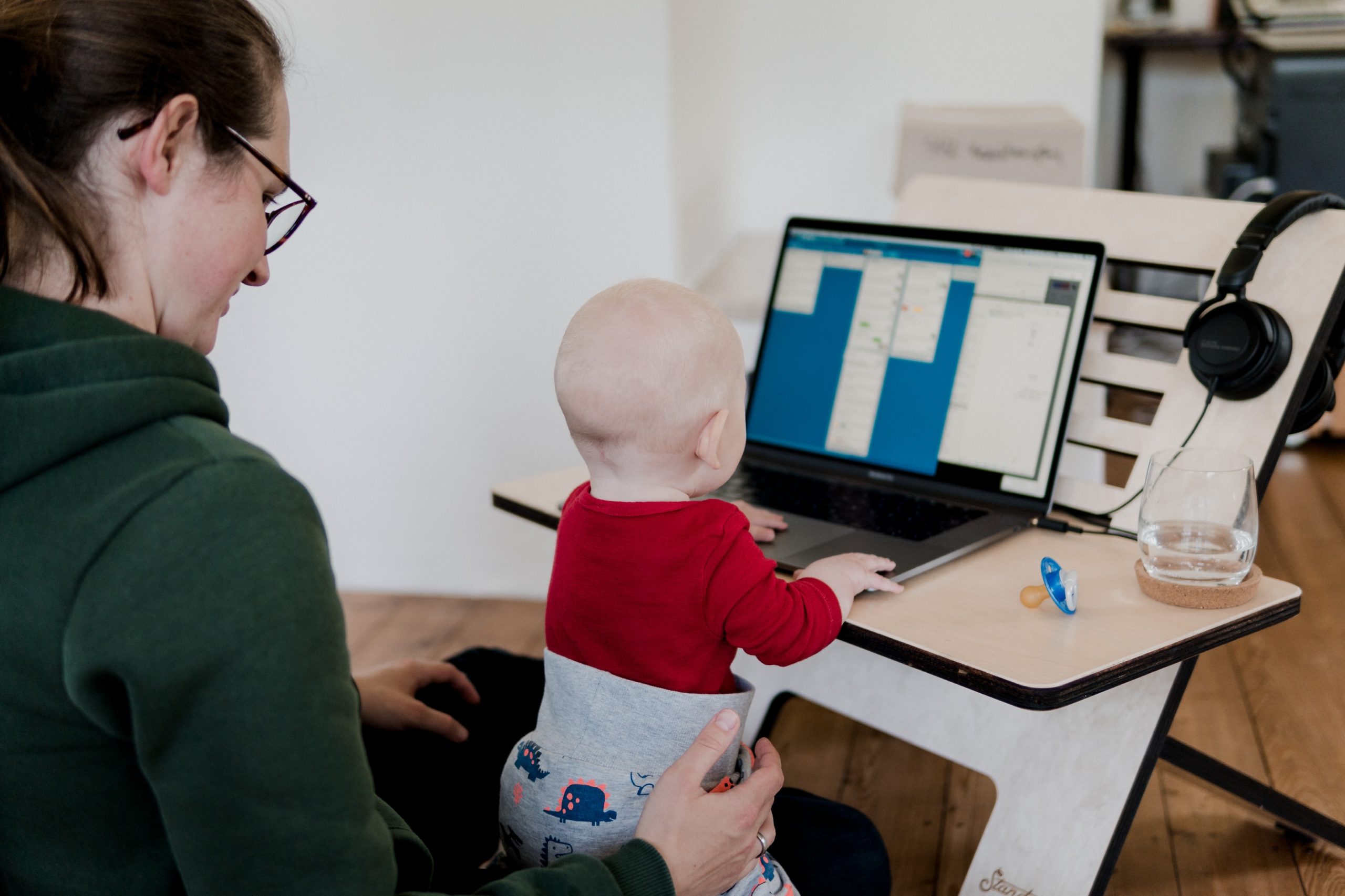 Toddler Typing on Home Laptop - 5 Productivity Hacks For Remote Teams