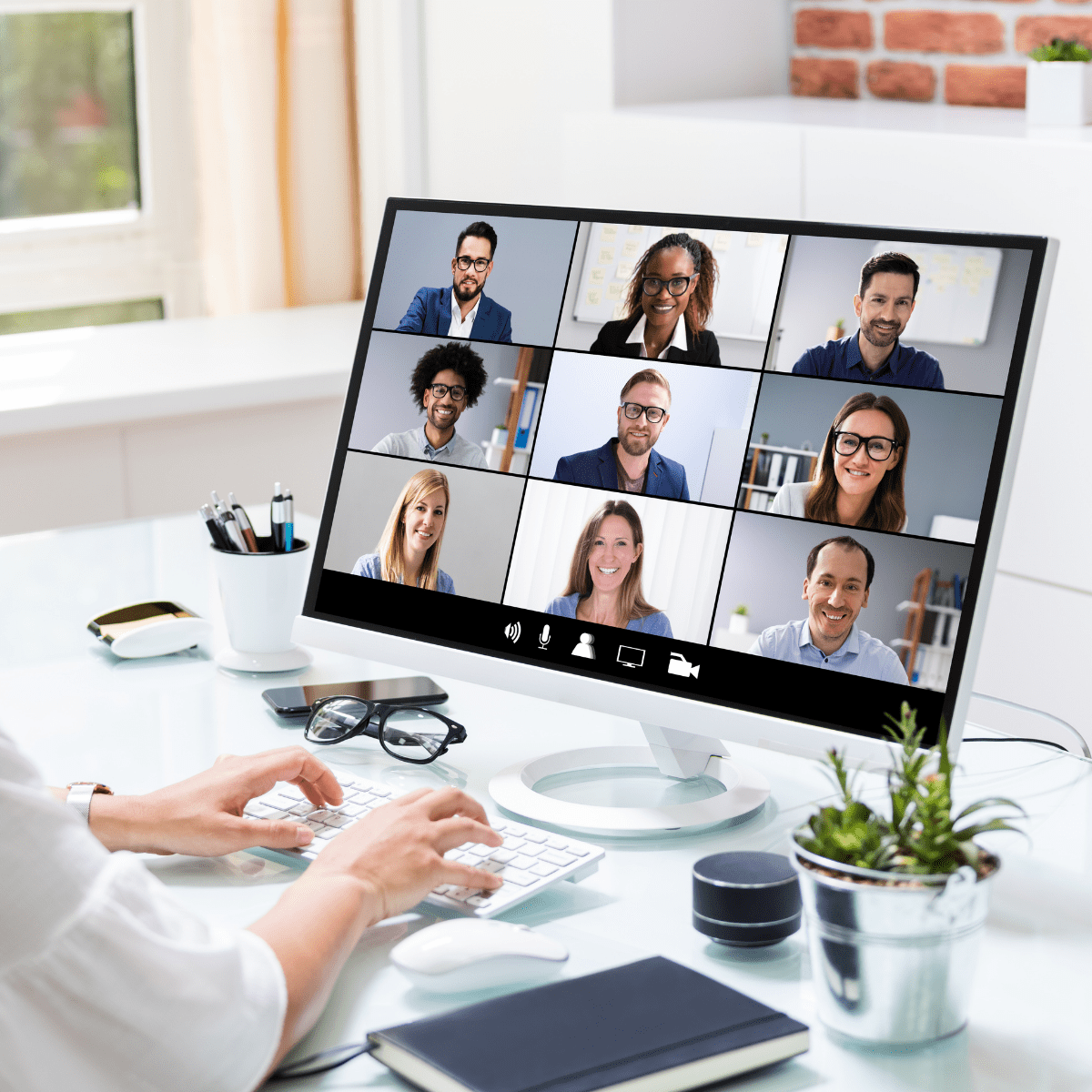 Hybrid Workspace Can Benefit From Video Conferencing - Video Conference on Desktop Computer