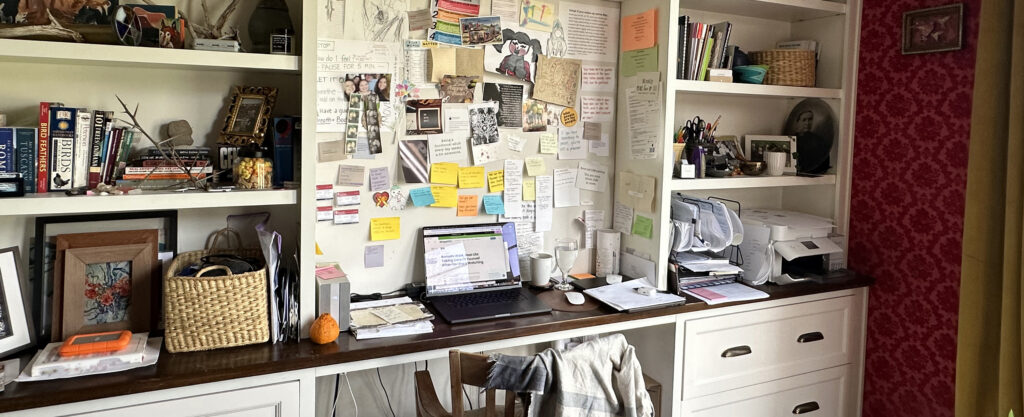 A real life remote work desk from VirtualPBX, demonstrating the pros and cons of a work-from-home environment and healthy ways to approach your work-from-home world.