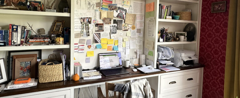 A real life remote work desk from VirtualPBX, demonstrating the pros and cons of a work-from-home environment and healthy ways to approach your work-from-home world.