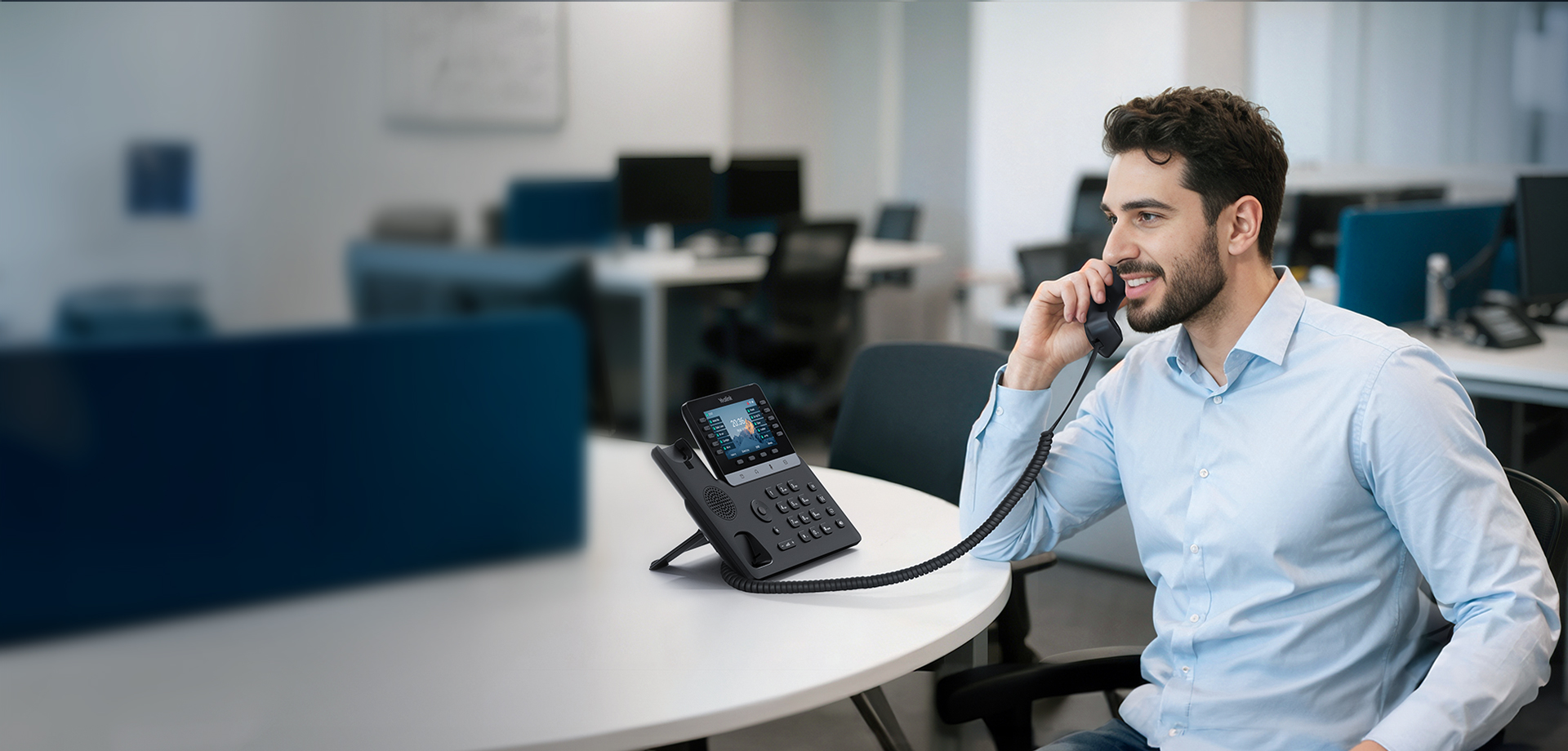 Yealink T7 Series desk phone in an office